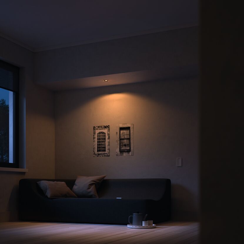 Gemütliche Sofaecke mit Leuchte und Bildern