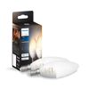 Zwei Philips Hue White Ambiance LED-Kerzenlampen und Verpackung.