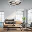 Wohnzimmer mit braunem Sofa, Couchtisch und modernen LED Deckenleuchten