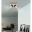 Zwei schwarze Spotlights an Holzbalken
