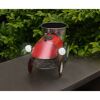 Roter Deko-Trecker mit Blumentopf