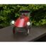 Roter Deko-Trecker mit Blumentopf