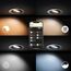 Vier Philips Hue Einbaustrahler mit unterschiedlichen Lichteinstellungen