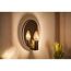 LED Kerze E14 gold, 15 W, dimmbar neben Spiegel