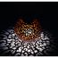 Solarlampe mit orientalischem Muster wirft Schatten