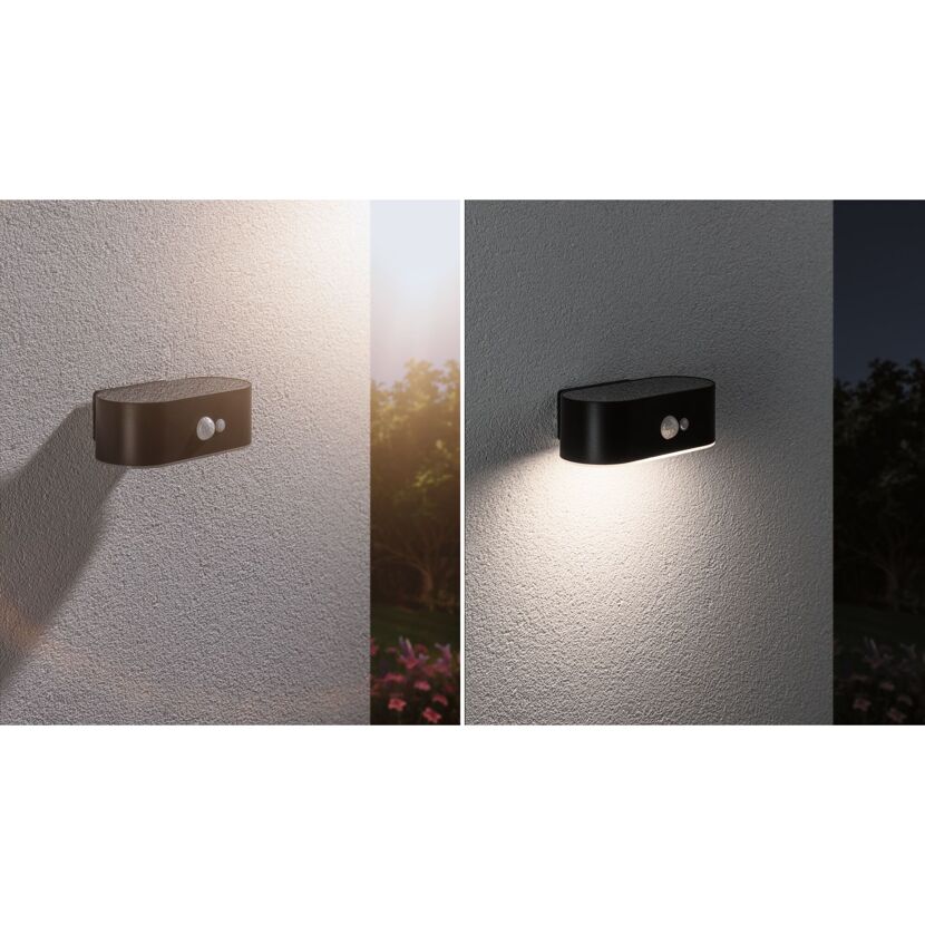 Solar Wandleuchte Adya an einer Hauswand, im Hellen und im Dunkeln leuchtend.