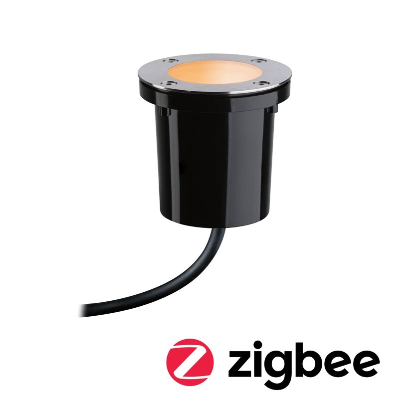 Schwarze Bodenleuchte mit silberner Oberseite und Kabel