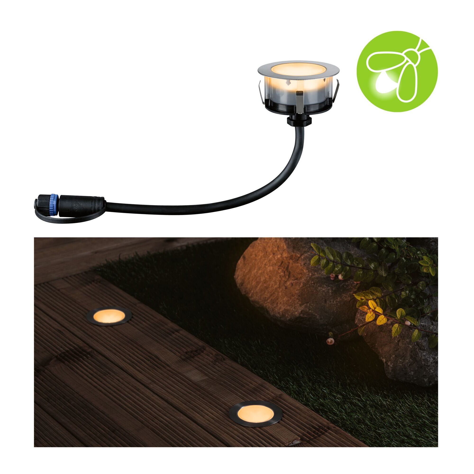Zwei leuchtende Plug & Shine Spotleuchten im Garten