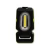 Schwarze LED Minileuchte mit grünem Rand und Halteclip.