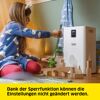 Kind spielt mit Bauklötzen neben Luftreiniger.