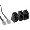 Drei schwarze TAE-Adapter und ein TAE-Kabel