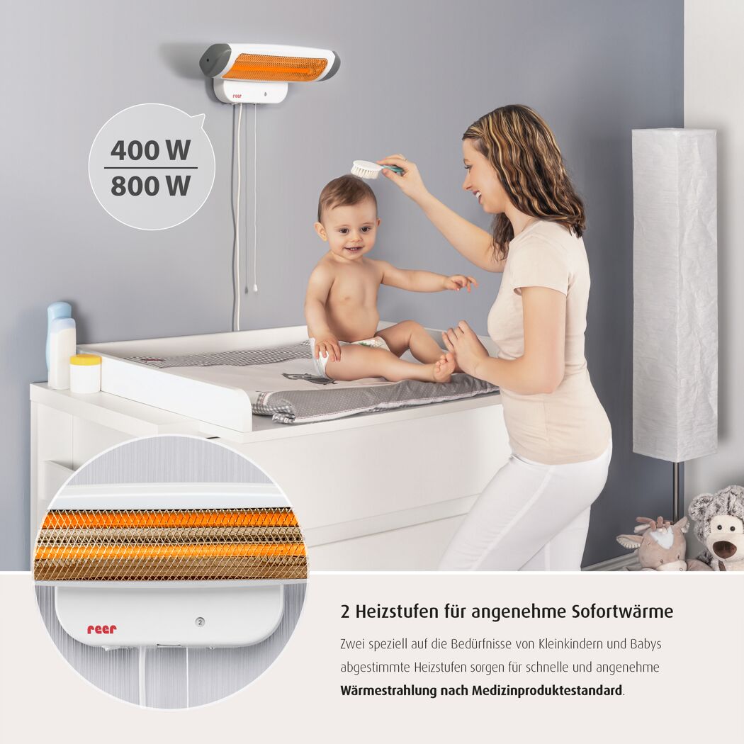 Baby auf Wickeltisch mit reer Wärmestrahler
