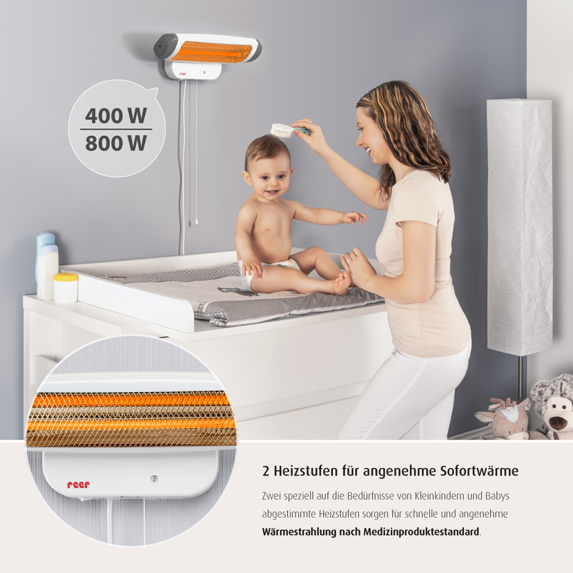 Baby auf Wickeltisch mit reer Wärmestrahler