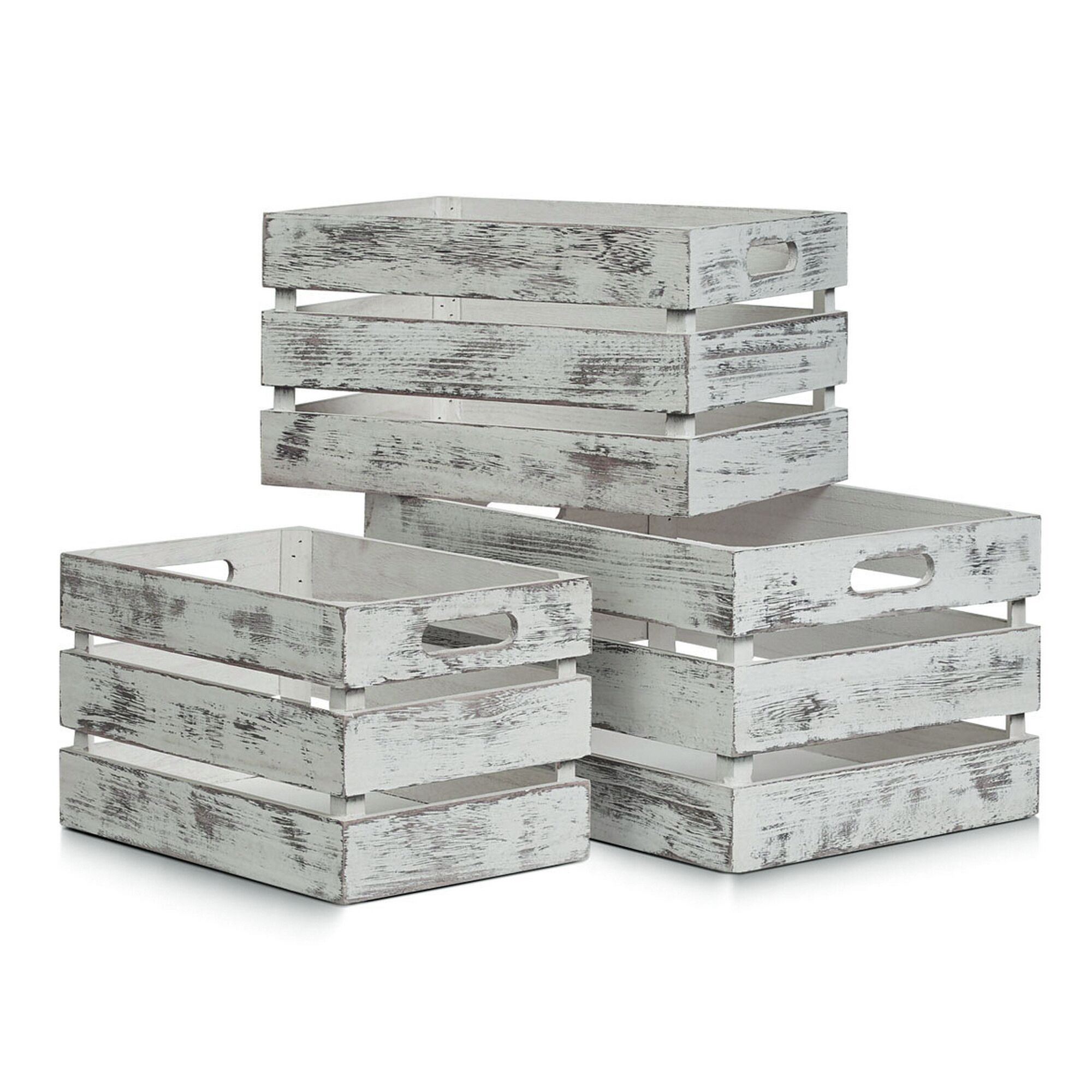 Drei weiße Holzkisten