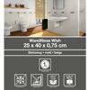 Beige Wandfliesen in einem Badezimmer.